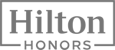 Logo of Hilton Honors, a loyalty rewards program for Hilton hotel guests.