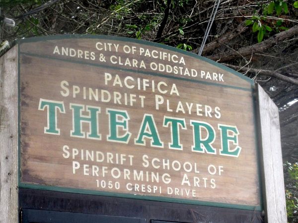 A theater sign for Pacifica Spindrift Players at Andres & Clara Oddstad Park, located at 1050 Crespi Drive.
